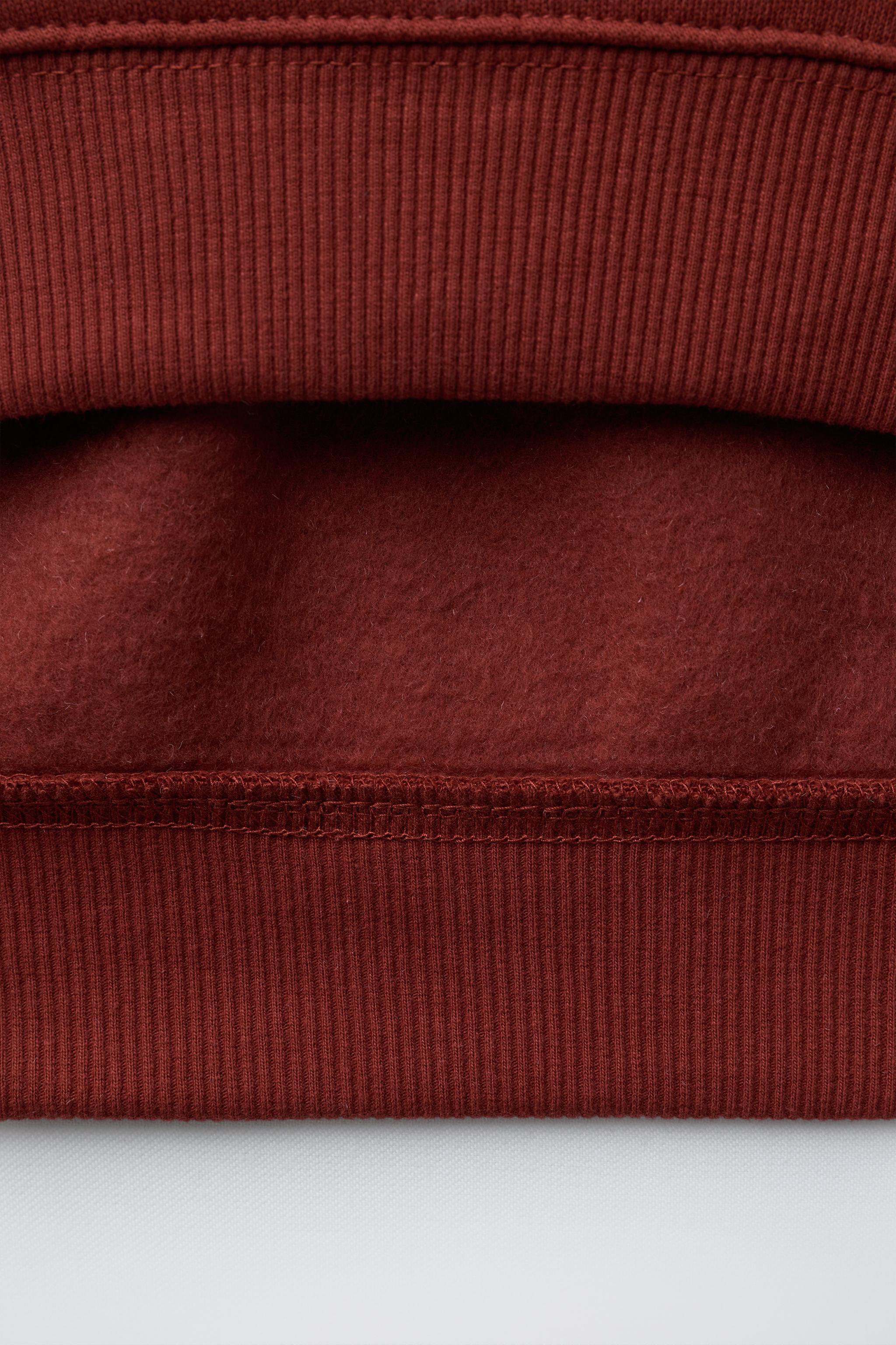 FLOCKED TEXT SWEATSHIRT